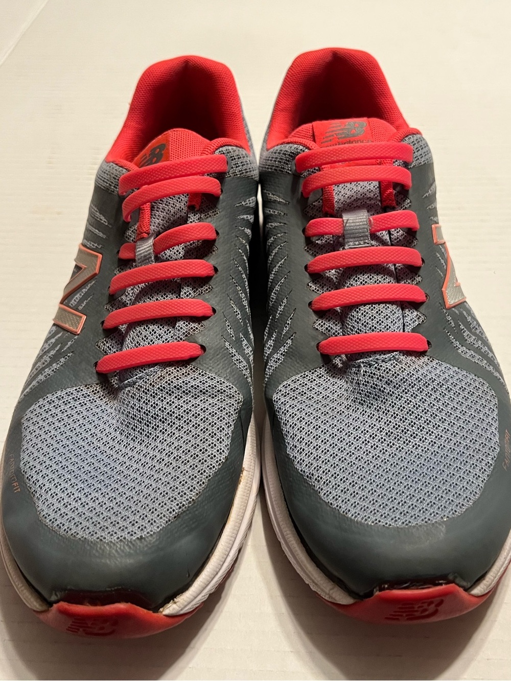 New Balance gray & pink women’s running shoes